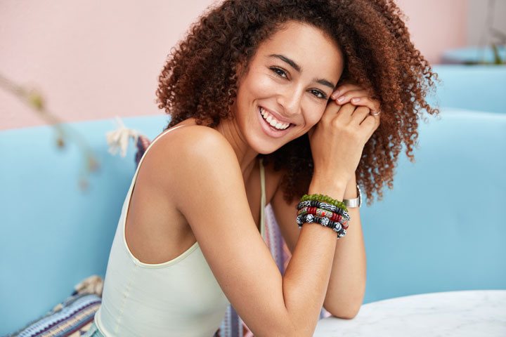 Brazilian latin sideways young woman with curly hair